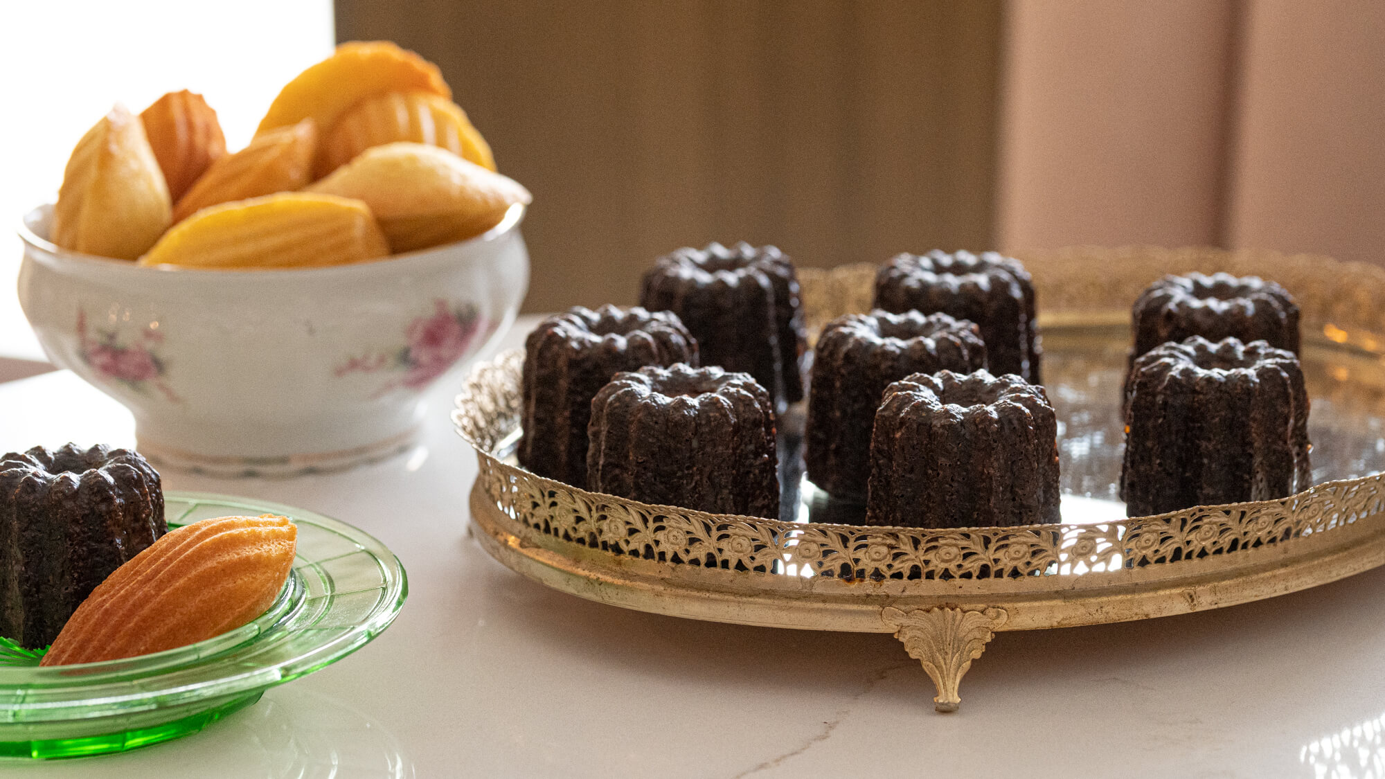 Gold tray of cannelés